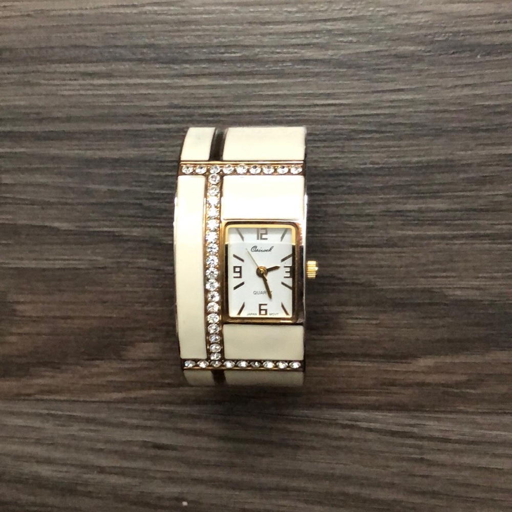 Cream/gold watch, from Vivah